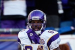 FOXBORO, MA - OCTOBER 31:  Randy Moss #84 of the Minnesota Vikings runs onto the field before a game against the New England Patriots at Gillette Stadium on October 31, 2010 in Foxboro, Massachusetts. (Photo by Jim Rogash/Getty Images)