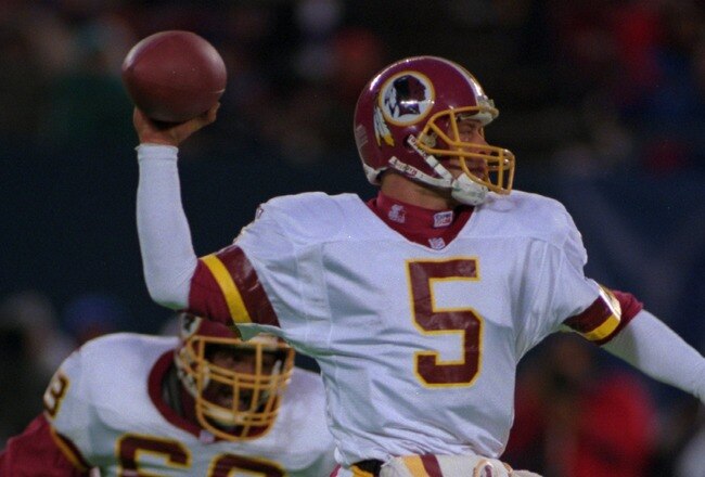 10 Dec 1995:  Quarterback Heath Shuler #5 of the Washington Redskins sets his feet before making a throw down field during the Redskins 20-13 loss to the New York Giants at Giants Stadium in The Meadowlands, New Jersey.   Mandatory Credit: Simon Bruty/ALL