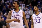 OKLAHOMA CITY - MARCH 20:  (L-R) Markieff Morris #21 and Marcus Morris #22 of the Kansas Jayhawks react against the Northern Iowa Panthers during the second round of the 2010 NCAA men's basketball tournament at Ford Center on March 20, 2010 in Oklahoma City, Oklahoma.  (Photo by Ronald Martinez/Getty Images)