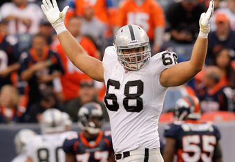 DENVER - OCTOBER 24:  Center Jared Veldheer #68 of the Oakland Raiders celebrates a touchdown by teammate Darren McFadden (not pictured) in the third quarter against the Denver Broncos at INVESCO Field at Mile High on October 24, 2010 in Denver, Colorado. The Raiders defeated the Broncos 59-14. (Photo by Justin Edmonds/Getty Images)