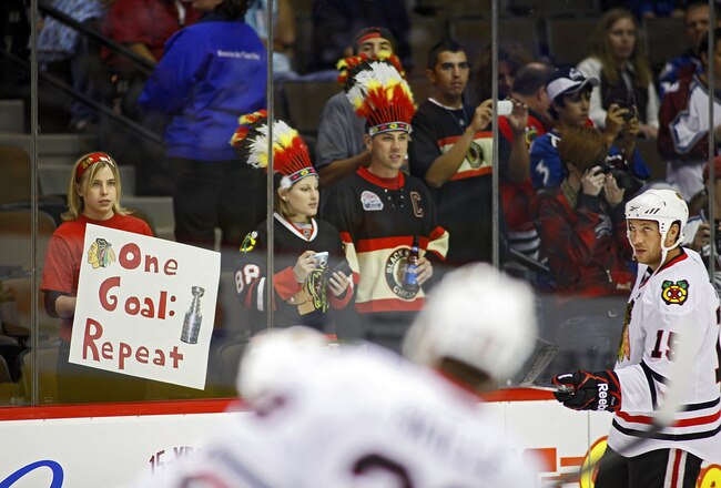 DENVER, CO - OCTOBER 7: Chicago Blackhawks fans get up close to the ice to welcome their team back to action as the players warm up before a game against the Colorado Avalanche during both team's season openers at the Pepsi Center on October 7, 2010 in Denver, Colorado. (Photo by Marc Piscotty/Getty Images)