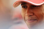 ABU DHABI, UNITED ARAB EMIRATES - NOVEMBER 11:  Lewis Hamilton of Great Britain and McLaren Mercedes is interviewed by the media during previews to the Abu Dhabi Formula One Grand Prix at the Yas Marina Circuit on November 11, 2010 in Abu Dhabi, United Arab Emirates.  (Photo by Mark Thompson/Getty Images)