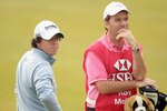 SHANGHAI, CHINA - NOVEMBER 07:  Rory McIlroy of Northern Ireland waits with his caddie JP Fitzgerald on the first hole during the final round of the WGC- HSBC Champions at Sheshan International Golf Club on November 7, 2010 in Shanghai, China.  (Photo by Andrew Redington/Getty Images)
