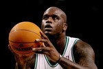 BOSTON, MA - OCTOBER 26: Shaquille O'Neal #36 of the Boston Celtics prepares to shoot a free-throw shot against the Miami Heat to the basket at the TD Banknorth Garden on October 26, 2010 in Boston, Massachusetts. NOTE TO USER: User expressly acknowledges and agrees that, by downloading and or using this photograph, User is consenting to the terms and conditions of the Getty Images License Agreement. (Photo by Jim Rogash/Getty Images)