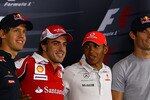 ABU DHABI, UNITED ARAB EMIRATES - NOVEMBER 11: (L-R) F1 World Championship contenders Sebastian Vettel of Germany and Red Bull Racing, Fernando Alonso of Spain and Ferrari, Lewis Hamilton of Great Britain and McLaren Mercedes and Mark Webber of Australia and Red Bull Racing pose for a photograph at the drivers press conference during previews to the Abu Dhabi Formula One Grand Prix at the Yas Marina Circuit on November 11, 2010 in Abu Dhabi, United Arab Emirates.  (Photo by Vladimir Rys/Getty Images)
