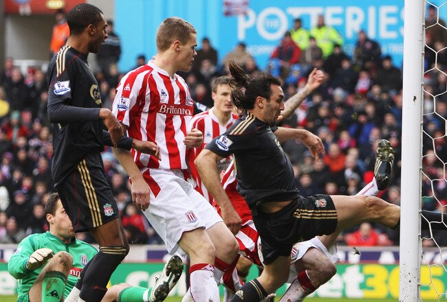 STOKE ON TRENT, ENGLAND - JANUARY 16:  Sotirios Kyrgiakos of Liverpool scores a goal during the Barclays Premier League match between Stoke City and Liverpool at the Britannia Stadium on January 16, 2010 in Stoke on Trent, England.  (Photo by Mark Thompson/Getty Images)