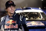 LONG BEACH, CA - DECEMBER 31: In this handout image provided by Red Bull Photofiles, Travis Pastrana poses after breaking the world record for the longest distance jump in a rally car on December 31, 2009 in Long Beach, California. The ramp to ramp jump was made over water at the 'RedBull: New Year. No Limits.' event. Pastrana jumped in his rally car off the Pine Street Pier onto a floating barge anchored in Long Beach's Rainbow Harbor, establishing a new record of 269, shattering the existing mark of 171 feet. (Photo by Garth Milan/Red Bull Photofiles via Getty Images)