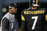 PITTSBURGH - DECEMBER 06:  Head coach Mike Tomlin of the Pittsburgh Steelers speaks with Ben Roethlisberger #7 during the game against the Oakland Raiders on December 6, 2009 at Heinz Field in Pittsburgh, Pennsylvania.  (Photo by Gregory Shamus/Getty Images)