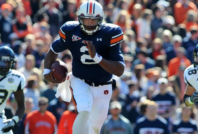 AUBURN, AL - NOVEMBER 6:  Quarterback Cam Newton #2 of the Auburn Tigers runs upfield against the Chattanooga Mocs November 6, 2010 at Jordan-Hare Stadium in Auburn, Alabama.  (Photo by Al Messerschmidt/Getty Images)
