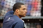 ARLINGTON, TX - OCTOBER 22:  Robinson Cano #24 of the New York Yankees looks on during batting practice against the Texas Rangers in Game Six of the ALCS during the 2010 MLB Playoffs at Rangers Ballpark in Arlington on October 22, 2010 in Arlington, Texas.  (Photo by Stephen Dunn/Getty Images)