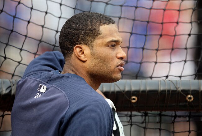ARLINGTON, TX - OCTOBER 22:  Robinson Cano #24 of the New York Yankees looks on during batting practice against the Texas Rangers in Game Six of the ALCS during the 2010 MLB Playoffs at Rangers Ballpark in Arlington on October 22, 2010 in Arlington, Texas.  (Photo by Stephen Dunn/Getty Images)
