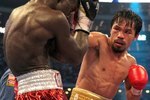 ARLINGTON, TX - MARCH 13:  (R-L) Manny Pacquiao of the Philippines throws a right to the head of Joshua Clottey of Ghana during the WBO welterweight title fight at Cowboys Stadium on March 13, 2010 in Arlington, Texas. Pacquiao defeated Clottey by unanimous decision.  (Photo by Jed Jacobsohn/Getty Images)