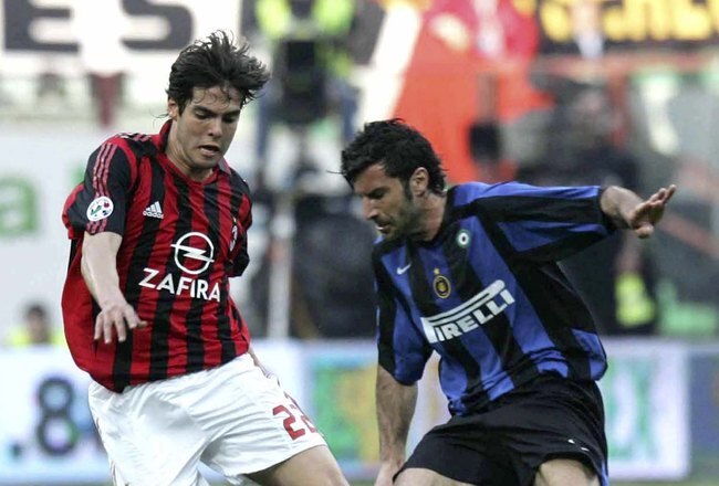 MILAN, ITALY - APRIL 14: Kaka of AC Milan challenges Luis Figo of Inter during the Serie A match between AC Milan and Inter Milan at the San Siro on April 14, 2006 in Milan, Italy. AC won the match 1-0. (Photo by Newpress/Getty Images)
