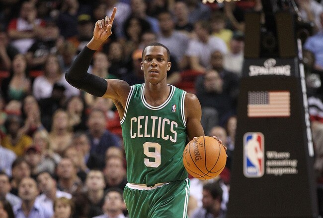 MIAMI - NOVEMBER 11:  Rajon Rondo #9 of the Boston Celtics brings the ball up the court during a game against the Miami Heat at American Airlines Arena on November 11, 2010 in Miami, Florida. NOTE TO USER: User expressly acknowledges and agrees that, by downloading and/or using this Photograph, User is consenting to the terms and conditions of the Getty Images License Agreement.  (Photo by Mike Ehrmann/Getty Images)