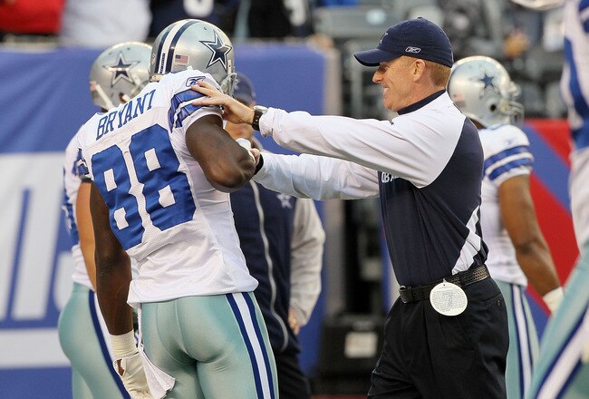 EAST RUTHERFORD, NJ - NOVEMBER 14:  Head coach Jason Garrett of the Dallas Cowboys jokes with Dez Bryant #88 as his team warms up prior to playing against the New York Giants on November 14, 2010 at the New Meadowlands Stadium in East Rutherford, New Jersey.  (Photo by Jim McIsaac/Getty Images)