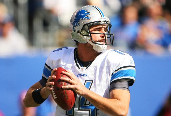 EAST RUTHERFORD, NJ - OCTOBER 17:  Shaun Hill #14 of the Detroit Lions drops back to pass against the New York Giants at New Meadowlands Stadium on October 17, 2010 in East Rutherford, New Jersey.  (Photo by Andrew Burton/Getty Images)