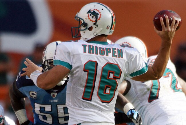MIAMI - NOVEMBER 14:  Quarterback Tyler Thigpen #16 of the Miami Dolphins passes against the Tennessee Titans at Sun Life Stadium on November 14, 2010 in Miami, Florida.  (Photo by Marc Serota/Getty Images)