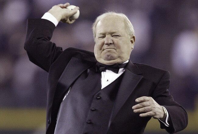 SEATTLE - MARCH 31:  Seattle Mariners play-by-play announcer Dave Niehaus throws out the ceremonial first pitch prior to the Mariners' Home Opener against the Texas Rangers on March 31, 2008 in Seattle, Washington. The Mariners defeated the Rangers 5-2. (Photo by Otto Greule Jr/Getty Images)