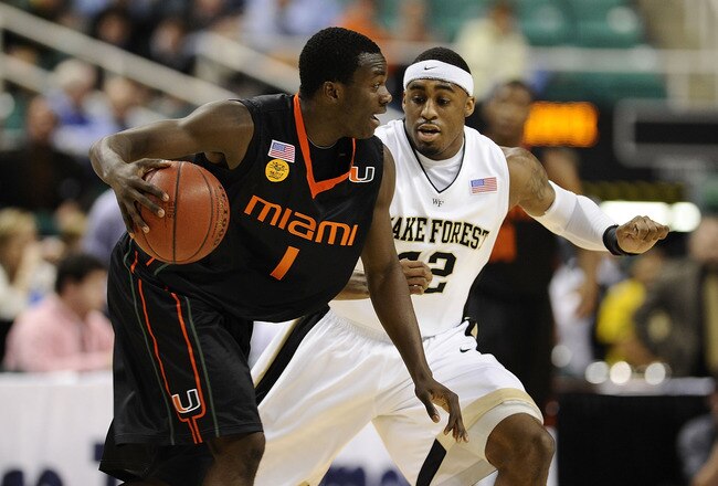 GREENSBORO, NC - MARCH 11:  L.D. Williams #42 of the Wake Forest Demon Deacons guards Durand Scott #1 of the University of Miami Hurricanes in their first round game in the 2010 ACC Men's Basketball Tournament at the Greensboro Coliseum on March 11, 2010 in Greensboro, North Carolina.  (Photo by Jeff Zelevansky/Getty Images)
