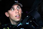 AVONDALE, AZ - NOVEMBER 13:  Denny Hamlin, driver of the #11 FedEx Toyota, sits in his car during practice for the NASCAR Sprint Cup Series Kobalt Tools 500 at Phoenix International Raceway on November 13, 2010 in Avondale, Arizona.  (Photo by Todd Warshaw/Getty Images for NASCAR)