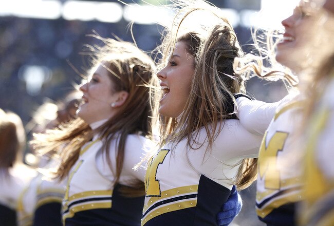ANN ARBOR, MI - NOVEMBER 06: Members of the Michigan Wolverines dance team perform while playing the Illinios Fighting Illini at Michigan Stadium on November 6, 2010 in Ann Arbor, Michigan. Michigan won the game 67-65.  (Photo by Gregory Shamus/Getty Images)