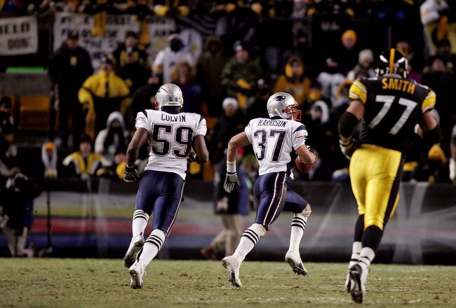 PITTSBURGH - JANUARY 23:  Rodney Harrison #37 of the New England Patriots returns an interception for a touchdown in the second quarter of the AFC championship game against the Pittsburgh Steelers at Heinz Field on January 23, 2005 in Pittsburgh, Pennsylvania.  (Photo by Al Bello/Getty Images)