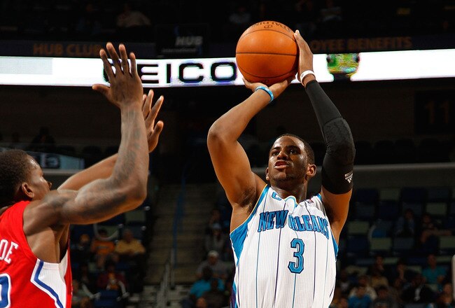 NEW ORLEANS - NOVEMBER 09:  Chris Paul #3 of the New Orleans Hornets shoots the ball over Eric Bledsoe #12 of the Los Angeles Clippers at the New Orleans Arena on November 9, 2010 in New Orleans, Louisiana.  NOTE TO USER: User expressly acknowledges and agrees that, by downloading and/or using this photograph, User is consenting to the terms and conditions of the Getty Images License Agreement.  (Photo by Chris Graythen/Getty Images)