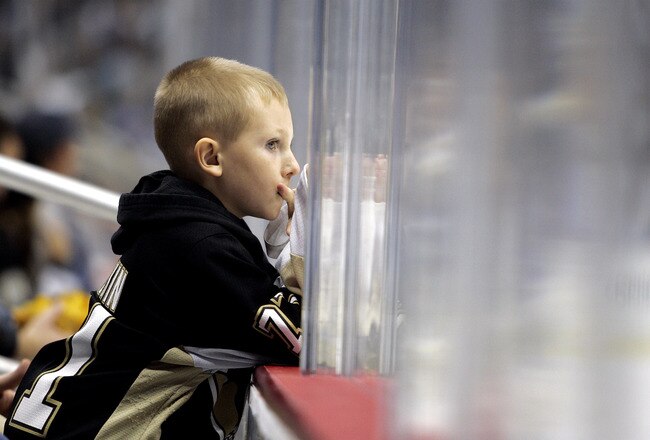 PITTSBURGH - NOVEMBER 15:  A young Pittsburgh Penguins fan look on during the game against the New York Rangers at Consol Energy Center on November 15, 2010 in Pittsburgh, Pennsylvania.  The Rangers defeated the Penguins 3-2 in overtime.  (Photo by Justin K. Aller/Getty Images)