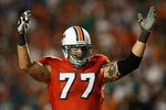 MIAMI - OCTOBER 12:  Offensive lineman Jake Long #77 of the Miami Dolphins celebrates after a touchdown by Ronnie Brown #23 against the New York Jets at Land Shark Stadium on October 12, 2009 in Miami, Florida. The Dolphins defeated the Jets 31-27.  (Photo by Doug Benc/Getty Images)