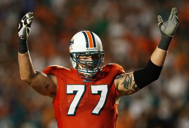 MIAMI - OCTOBER 12:  Offensive lineman Jake Long #77 of the Miami Dolphins celebrates after a touchdown by Ronnie Brown #23 against the New York Jets at Land Shark Stadium on October 12, 2009 in Miami, Florida. The Dolphins defeated the Jets 31-27.  (Photo by Doug Benc/Getty Images)