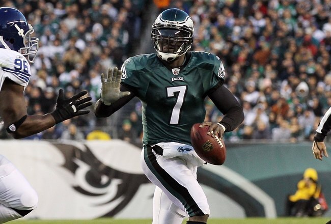 PHILADELPHIA - NOVEMBER 07:  Michael Vick #7 of the Philadelphia Eagles in against Keyunta Dawson #96 of the Indianapolis Colts on November 7, 2010 at Lincoln Financial Field in Philadelphia, Pennsylvania. The Eagles defeated the Colts 26-24.  (Photo by Jim McIsaac/Getty Images)