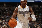 DENVER - NOVEMBER 16:  Al Harrington #7 of the Denver Nuggets dribbles the ball against the New York Knicks at the Pepsi Center on November 16, 2010 in Denver, Colorado. The Nuggets defeated the Knicks 120-118. NOTE TO USER: User expressly acknowledges and agrees that, by downloading and/or using this Photograph, User is consenting to the terms and conditions of the Getty Images License Agreement.  (Photo by Doug Pensinger/Getty Images)
