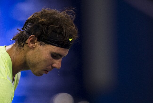 SHANGHAI, CHINA - OCTOBER 13:  Sweat drips off the face of Rafael Nadal of Spain during his match against Stanislas Wawrinka of Switzerland during day three of the 2010 Shanghai Rolex Masters at the Shanghai Qi Zhong Tennis Center on October 13, 2010 in Shanghai, China.  (Photo by Victor Fraile/Getty Images)