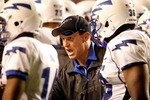 FORT WORTH, TX - OCTOBER 23:  Head coach Troy Calhoun of the Air Force Falcons leads his team on the field against the TCU Horned Frogs at Amon G. Carter Stadium on October 23, 2010 in Fort Worth, Texas.  (Photo by Tom Pennington/Getty Images)
