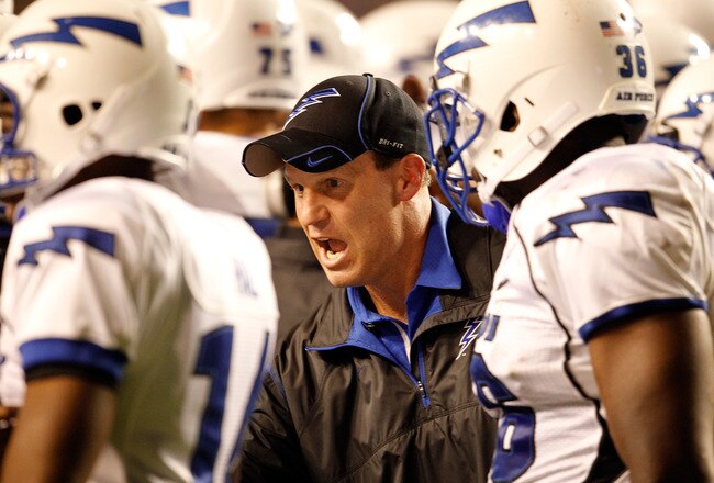 FORT WORTH, TX - OCTOBER 23:  Head coach Troy Calhoun of the Air Force Falcons leads his team on the field against the TCU Horned Frogs at Amon G. Carter Stadium on October 23, 2010 in Fort Worth, Texas.  (Photo by Tom Pennington/Getty Images)