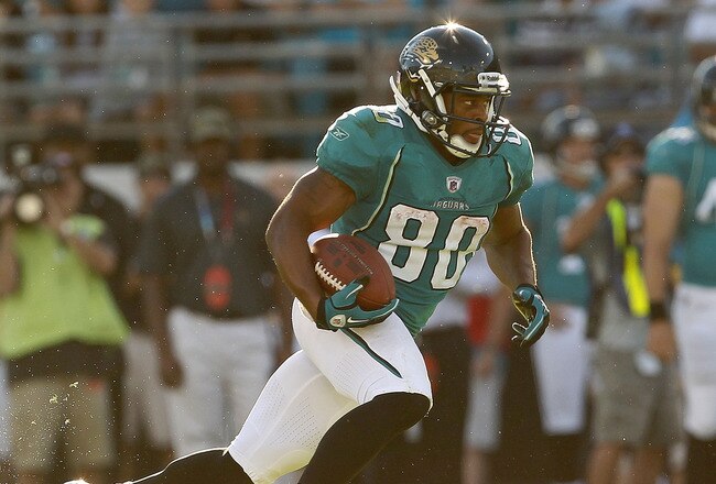 JACKSONVILLE, FL - NOVEMBER 14:  Mike Thomas #80 of the Jacksonville Jaguars runs after a catch during a game against the Houston Texans at EverBank Field on November 14, 2010 in Jacksonville, Florida.  (Photo by Mike Ehrmann/Getty Images)