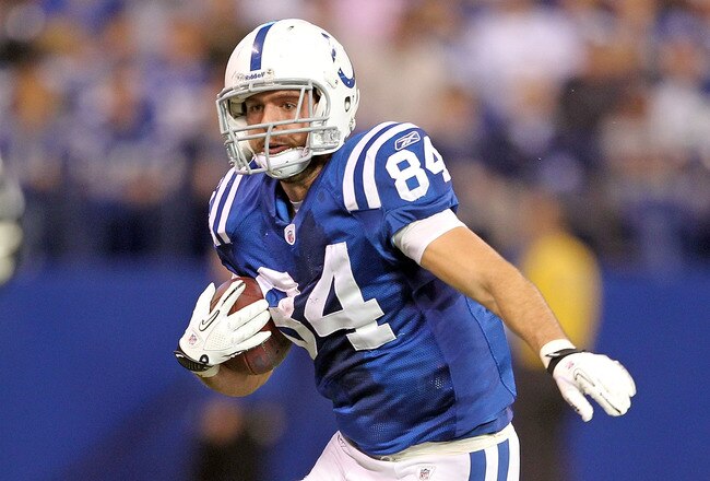 INDIANAPOLIS - NOVEMBER 14:  Jacob Tamme #84 of the Indianapolis Colts runs with the ball after catching a pass during the NFL game against the Cincinnati Bengals at Lucas Oil Stadium on November 14, 2010 in Indianapolis, Indiana. The Colts won 23-17.  (Photo by Andy Lyons/Getty Images)
