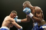 LAS VEGAS - APRIL 11:  Paul Williams (R) hits Winky Wright in the second round of their middleweight bout at the Mandalay Bay Events Center April 11, 2009 in Las Vegas, Nevada. Williams won by unanimous decision.  (Photo by Ethan Miller/Getty Images)