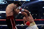 ARLINGTON, TX - NOVEMBER 13:  Manny Pacquiao (R in white trunks) of the Philippines lands a punch against Antonio Margarito (black trunks) of Mexico during their WBC World Super Welterweight Title bout at Cowboys Stadium on November 13, 2010 in Arlington, Texas.  (Photo by Nick Laham/Getty Images)
