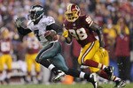 LANDOVER, MD - NOVEMBER 15:  Michael Vick #7 of the Philadelphia Eagles makes a break past Brian Orakpo #98 of the Washington Redskins on November 15, 2010 at FedExField in Landover, Maryland.  (Photo by Chris McGrath/Getty Images)