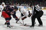 COLUMBUS, OH - OCTOBER 20:  Saku Koivu #11 of the Anaheim Ducks faces off against Antoine Vermette #50 of the Columbus Blue Jackets during a game on October 20, 2010 at Nationwide Arena in Columbus, Ohio. (Photo by Gregory Shamus/Getty Images)