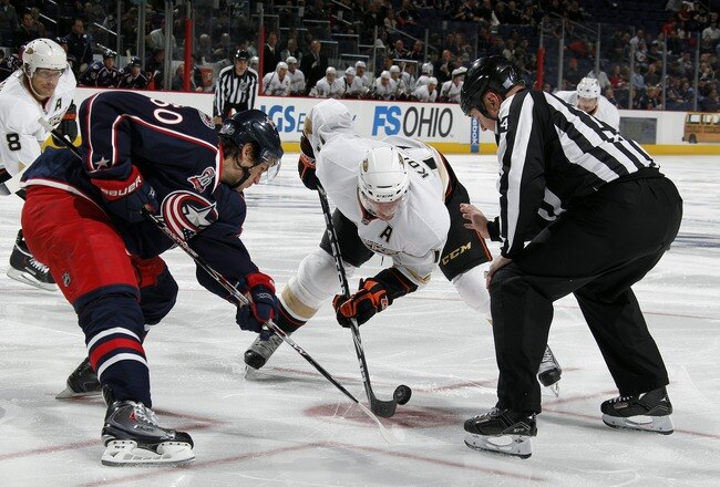 COLUMBUS, OH - OCTOBER 20:  Saku Koivu #11 of the Anaheim Ducks faces off against Antoine Vermette #50 of the Columbus Blue Jackets during a game on October 20, 2010 at Nationwide Arena in Columbus, Ohio. (Photo by Gregory Shamus/Getty Images)
