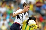 RIO DE JANIERO, BRAZIL - JULY 26:  Kaley Fountain #4 of the United States of America goes up for a header with Tobin Heath #11 of Brazil during the Women's Gold Medal Match at the 2007 XV Pan American Games at Maracana Stadium on July 26, 2007 in Rio de Janeiro, Brazil.  (Photo by Jeff Gross/Getty Images)