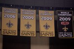 NEW ORLEANS - SEPTEMBER 09:  The banners representing achievements of the New Orleans Saints, including the newly unveiled 2009 Super Bowl World Champions banner, hang above the fans in the upper deck during the Saints game against the Minnesota Vikings at Louisiana Superdome on September 9, 2010 in New Orleans, Louisiana.  (Photo by Chris Graythen/Getty Images)