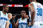 NEW ORLEANS - NOVEMBER 17:  Chris Paul #3 talks with Trevor Ariza #1 and David West #30 of the New Orleans Hornets during a timeout against the Dallas Mavericks at the New Orleans Arena on November 17, 2010 in New Orleans, Louisiana.  The Hornets defeated the Mavericks 99-97.  NOTE TO USER: User expressly acknowledges and agrees that, by downloading and/or using this photograph, User is consenting to the terms and conditions of the Getty Images License Agreement.  (Photo by Chris Graythen/Getty Images)