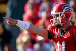 JACKSONVILLE, FL - OCTOBER 30:  Quarterback Aaron Murray #11 of the Georgia Bulldogs points during the game against the Florida Gators at EverBank Field on October 30, 2010 in Jacksonville, Florida.  (Photo by Sam Greenwood/Getty Images)