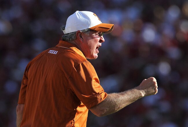 DALLAS - OCTOBER 02:  Head coach Mack Brown of the Texas Longhorns yells on the sidelines during play against the Oklahoma Sooners at the Cotton Bowl on October 2, 2010 in Dallas, Texas.  (Photo by Ronald Martinez/Getty Images)
