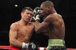 ATLANTIC CITY, NJ - NOVEMBER 20:  Sergio Martinez and Paul Williams exchange punches during their Middleweight Championship fight on November 20, 2010 at The Boardwalk Hall in Atlantic City, New Jersey.  (Photo by Al Bello/Getty Images)