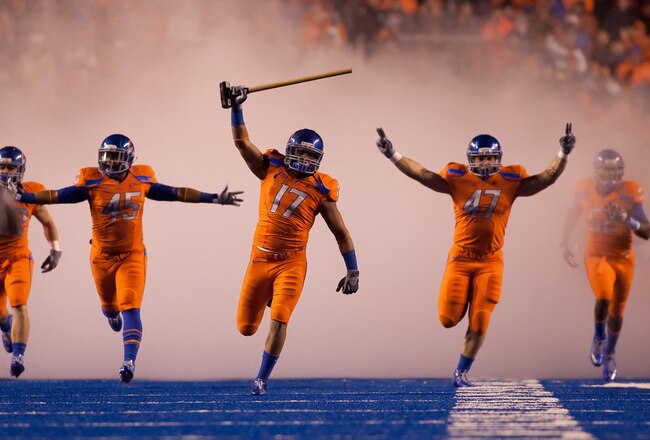 BOISE, ID - NOVEMBER 19:  Winston Venable #17 leads the Boise State Broncos onto the field before their game against the Fresno State Bulldogs at Bronco Stadium on November 19, 2010 in Boise, Idaho.  (Photo by Otto Kitsinger III/Getty Images)