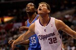 LOS ANGELES - NOVEMBER 3:  Blake Griffin #32 of the Los Angeles Clippers and Kevin Durant #35 of the Oklahoma City Thunder look for a rebound at Staples Center on November 3, 2010 in Los Angeles, California.  NOTE TO USER: User expressly acknowledges and agrees that, by downloading and or using this photograph, User is consenting to the terms and conditions of the Getty Images License Agreement. (Photo by Stephen Dunn/Getty Images)